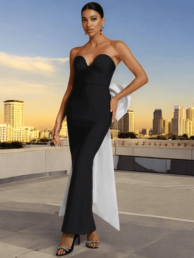 Black sleeveless bandage maxi dress with white bow and open back for evening events