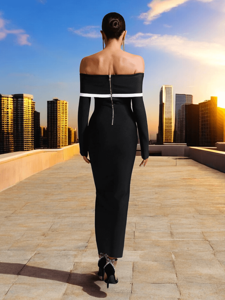 Yuka brand black and white stripe off-shoulder dress, hugging curves on a model standing back