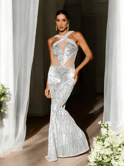 Silver Halter Sequin Maxi Dress with sparkling sequins and a flattering silhouette for weddings and formal events.