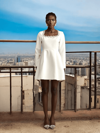 White Long Sleeve Crystal A-Line Dress with sparkling details and a flattering silhouette for weddings and formal events.