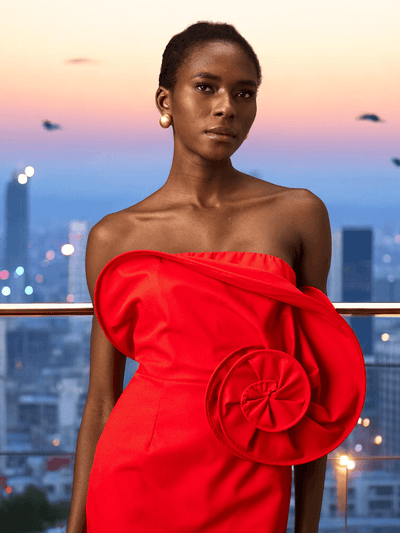 Aluna Off-Shoulder Red Mini Dress with bold sculptural rose accent, perfect for weddings and special occasions.