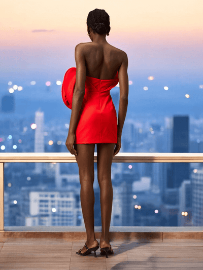 Aluna Off-Shoulder Red Mini Dress with bold sculptural rose accent, perfect for weddings and special occasions.