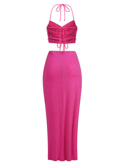 Hot pink two-piece maxi dress with halter neckline and embellishments