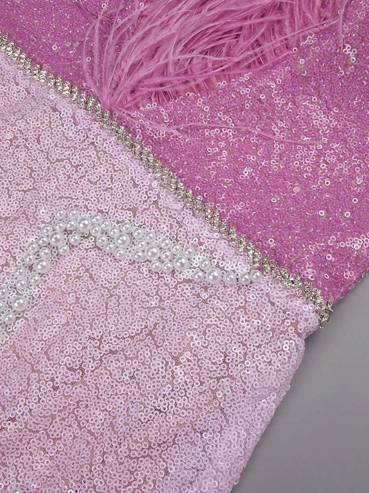 Close-up of Feathers Patchwork Sparkling Sequins Maxi Dress in Pink showing detailed sequins and feather design.