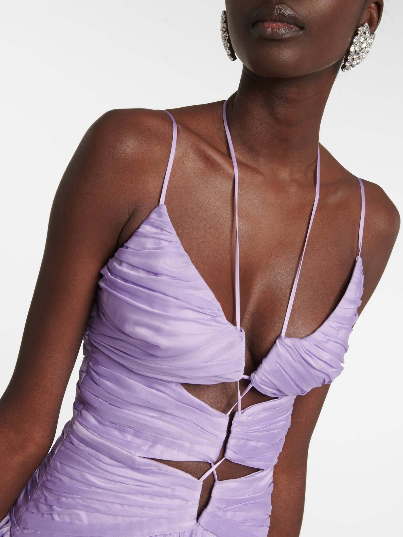 Elegant gown dress in purple chiffon with delicate spaghetti straps for a graceful look.