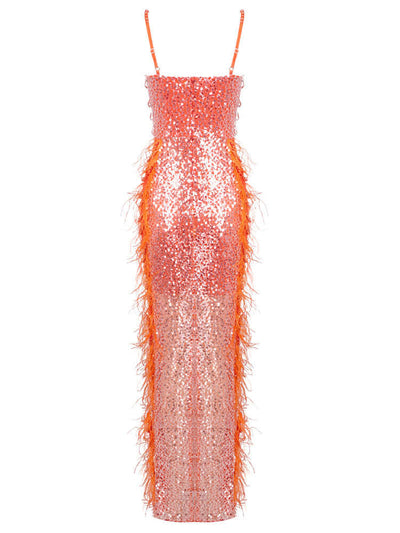 Flowing orange maxi dress from Noura Couture adorned with pearls