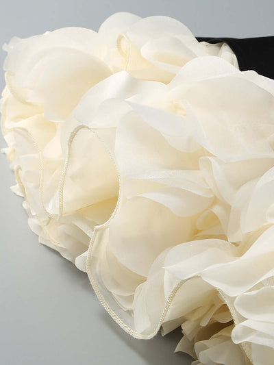 Close-up of floral petal detailing on Liz doll-inspired mini dress
