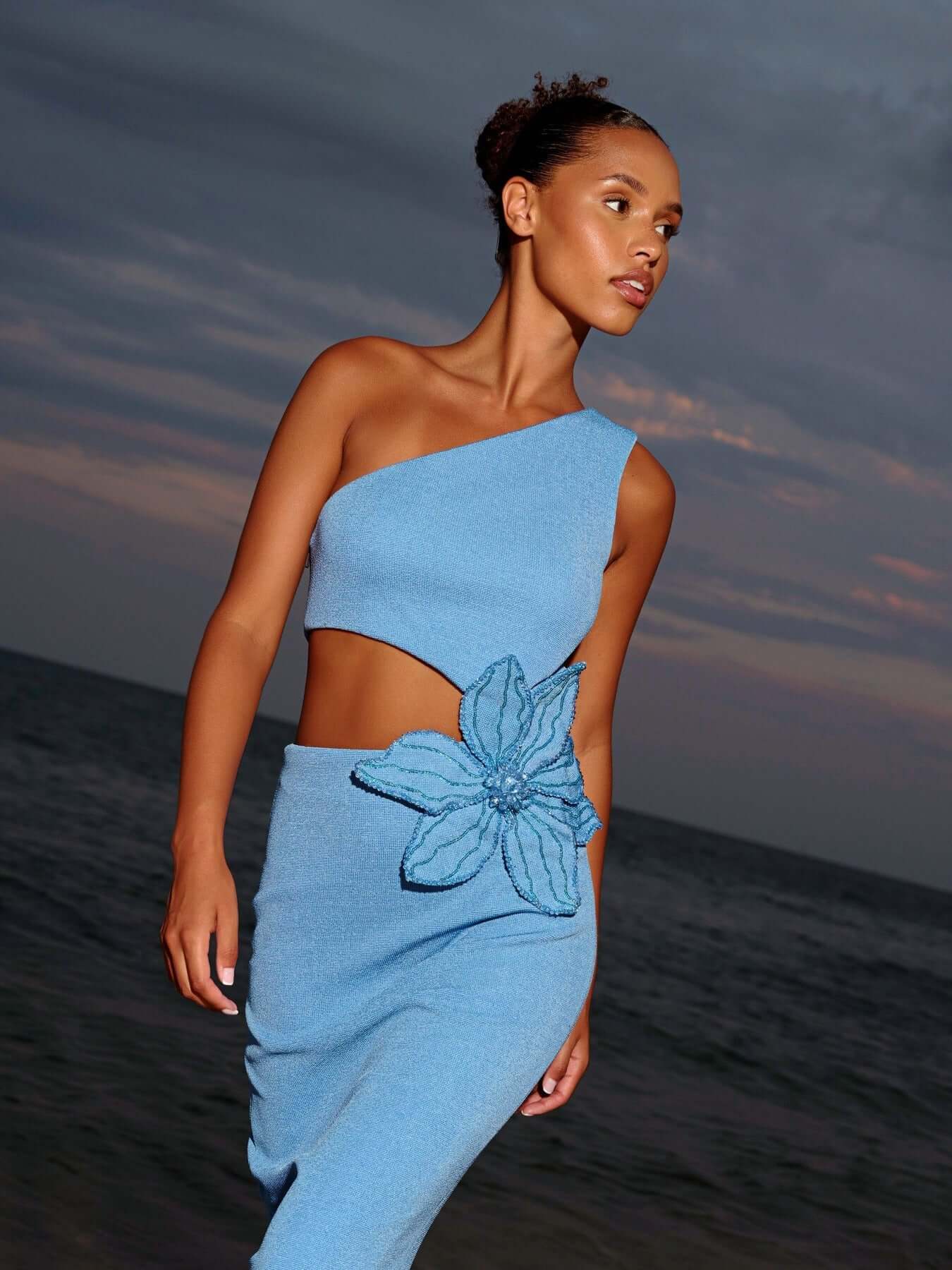 Blue midi dress with one shoulder and embellished flower detail