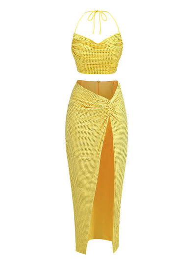 Yellow two-piece maxi dress with halter neckline and embellishments