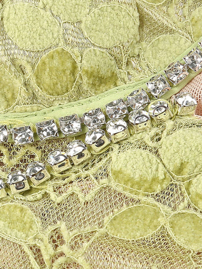 Close-up of crystal detailing on the green lace fabric of the Crystal Bustier Lace Midi Dress by Valensia Seven