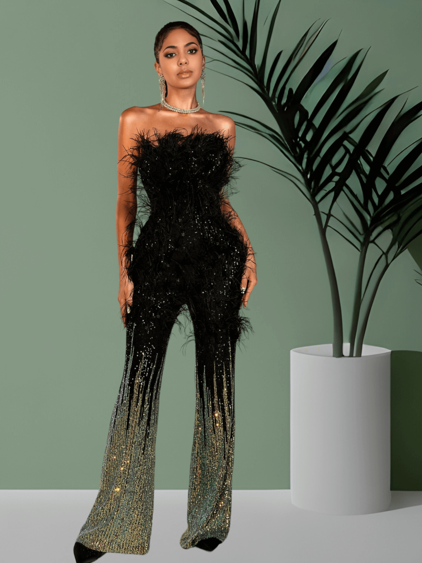 Glamorous strapless jumpsuit adorned with sequins and feathers, perfect for a stylish evening look
