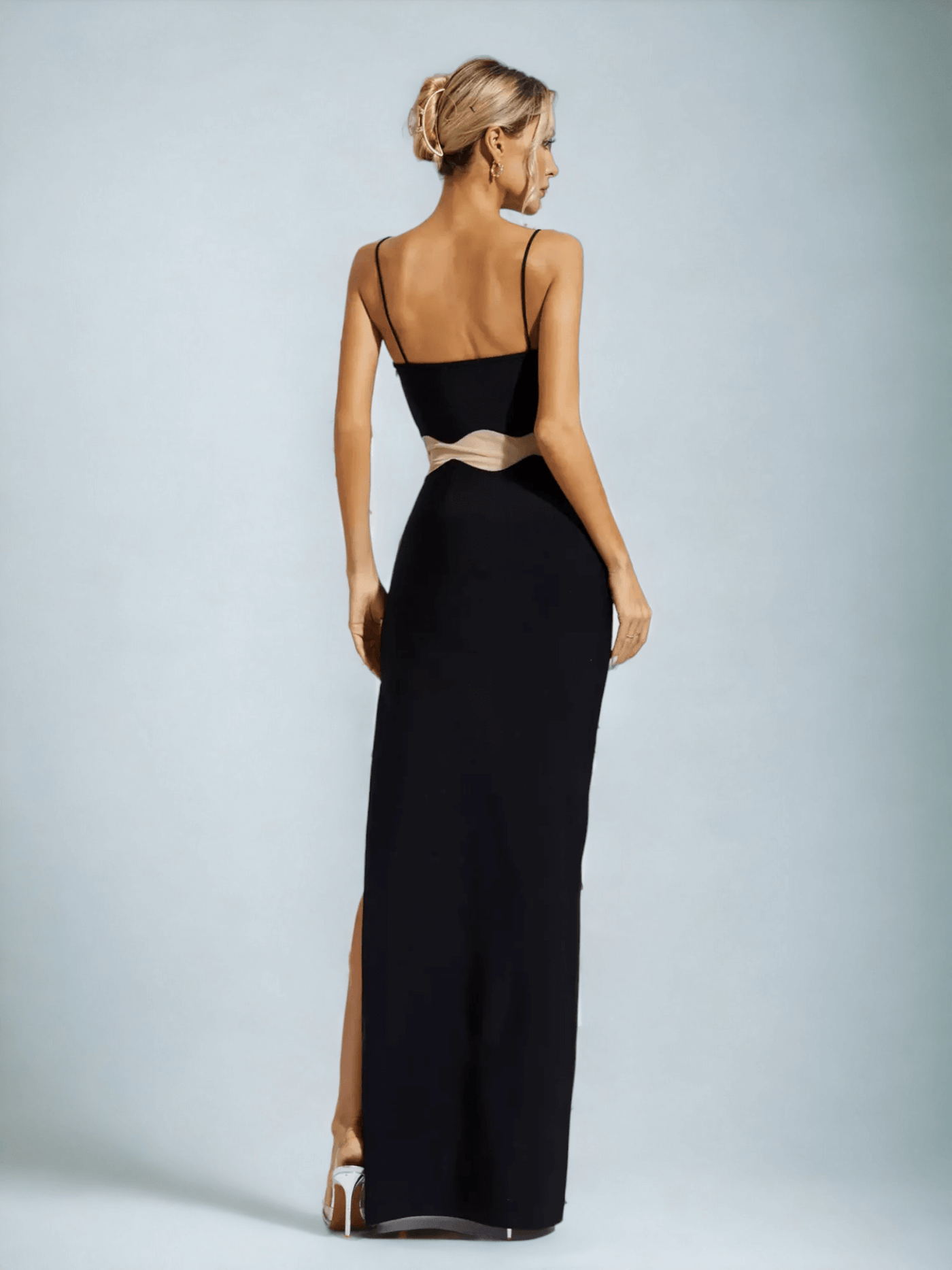 Elegant long dress featuring maxi length and tulle-panel detailing.