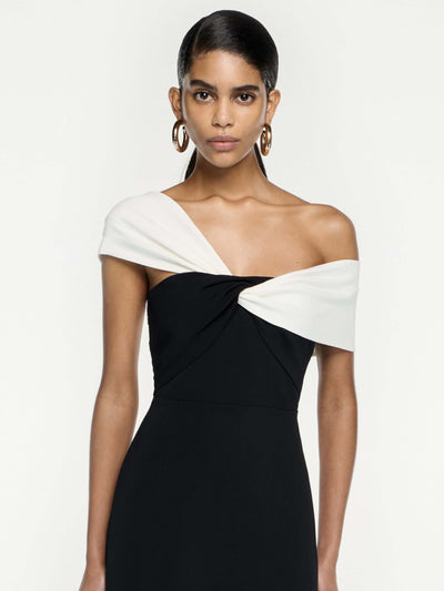 Chic sleeveless dress featuring a color block design, perfect for evening parties