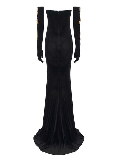 Maxi dress crafted from velvet fabric, adorned with a charming butterfly chain embellishment