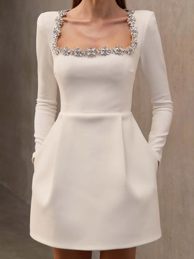 White long sleeve A-line dress with crystal detailing