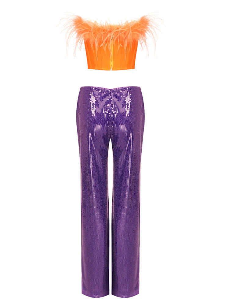 Feather strapless crop top paired with sequin trousers in a stylish suit