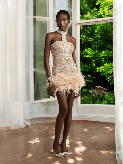 Nida halterneck mini dress with pearl embellishments and feather details