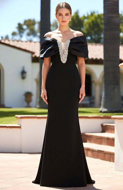 Black off-shoulder evening gown with pearl plunge neckline outdoors