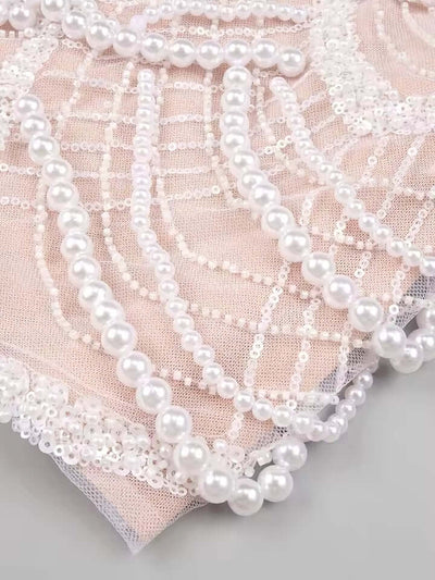 Miha Off The Shoulder Pearl Mini Dress with delicate pearl accents and off-the-shoulder design.