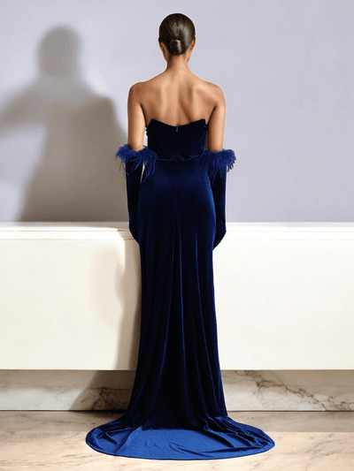 Saira Velvet Blue Slit Maxi Gown with side slit and flowing silhouette.