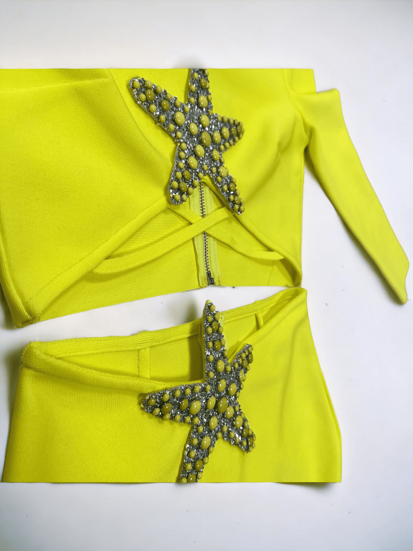 Luxury set featuring a beaded starfish diamond top and high-waisted split skirt