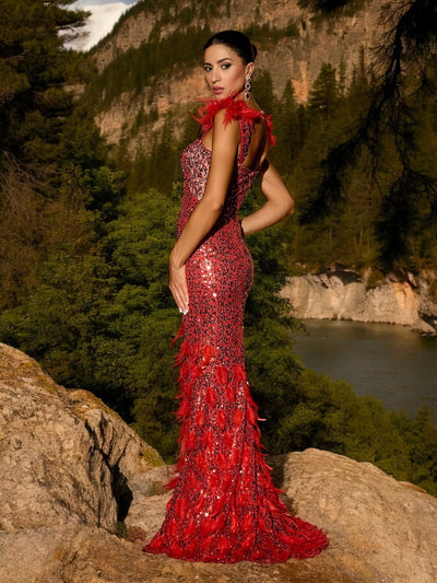Woman posing in nature wearing Red Glitter Sequins Maxi Dress with slight stretch and invisible zipper opening, featuring glittery sequins and feather details