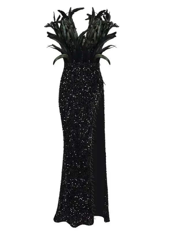 Glamorous black sequin dress with a high split, V-neckline, and feather decorations for an elegant look